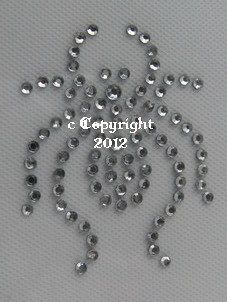 some silver colored beads on a gray background with the words copyright 2012 written in white