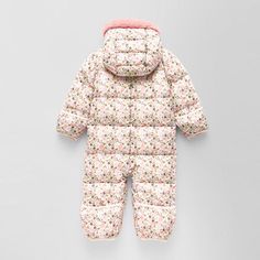 This Okie Dokie baby girl's snow suit is an adorable, super cozy must-have for her snow adventures. Made from a warm quilted fabric, this long-sleeve puffer suit has a full zip closure and a faux fur trimmed hood for extra protection. Features: Faux Fur Trim, HoodedClosure Type: ZipperPockets: 2 Front Slip PocketsWarmth Factor: HeavyweightFiber Content: 100% PolyesterFilling Content: 100% PolyesterLining Material: PolyesterCare: Line Dry, Machine WashCountry of Origin: Imported Playful Pink Winter Onesie, Pink Fitted Onesie For Winter, Toddler Snow Outfit, Snow Adventure, Suit White, Snow Wear, Pink Snow, Okie Dokie, Snow Outfit