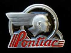 the emblem for pontiac is shown on a black background with red lettering and a man's head