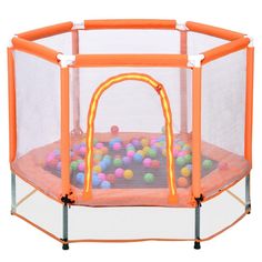 an orange playpen with balls in it