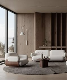 a living room filled with white furniture and large windows next to a wooden flooring wall