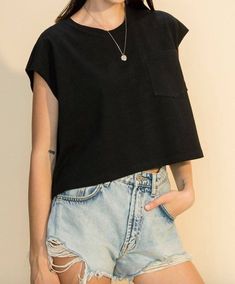 Oversized cropped muscle tee, crew neck with pocket in black. -100% Cotton Casual Cotton Crop Top With Pockets, Black Summer Tops With Pockets, Oversized Crew Neck Top With Pockets, Black Cropped T-shirt With Crew Neck, Black Crew Neck Cropped T-shirt, Oversized Cropped T-shirt For Everyday, Everyday Oversized Cropped T-shirt, Black Casual Cropped T-shirt With Crew Neck, Black Crew Neck Top With Side Pockets