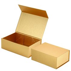 an open cardboard box with the lid closed and two empty boxes in front of it