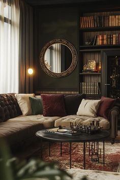 a living room filled with lots of furniture next to a book shelf full of books