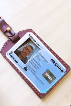 a close up of a person's identification card on a table