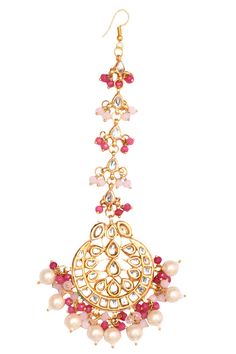 Enhance your ethnic look with this Kundan mang tika with pearl-like details. Product Features: Color: Pearl & Pink beaded Gold tone Kundan Handcrafted Mang Tikka Material: Metal copper alloy, Synthetic Pearls/beads, onyx beads work : kundan with meenkari on back side Dimension: Length - 7.2in, Width - 2in Pack Of: mang tika Occasion: festive and wedding Disclaimer: There will be slight difference in digital to actual image Mang Tika, Mang Tikka, Beads Work, Ethnic Looks, Pearl Pink, Onyx Bead, Pearl Beads, Bead Work, Product Features