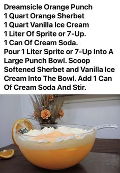 an orange punch recipe in a bowl on a table with the instructions for how to make it