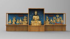 three wooden shelves with statues and clocks in them on top of each shelf is a blue wall