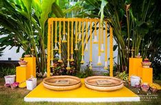 an outdoor area with yellow and white decorations