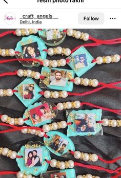 several necklaces with pictures on them and some red string attached to the bead