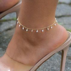 "A beautiful, and dainty freshwater pearl anklet. It's the perfect summer accessory! ~Details~ - Made of 14k Gold plated over 925 Sterling Silver (we use a thick plating, for a piece that will last year many years) - Made of freshwater pearls - Measures 9\" + 1\" Extension Chain - Lobster Clasp Closure Ships same day for quick delivery! Happy to answer any questions! :)" Dainty Summer Party Anklets, Elegant Adjustable Anklets For Spring, Elegant Gold Pearl Bracelet For Summer, Adjustable Gold Pearl Bracelet For Summer, Elegant Beaded Summer Anklets, Elegant Summer Pearl Bracelet For The Beach, Elegant Summer Pearl Bracelet For Beach, Pearl Bracelet For Summer Beach, Elegant Spring Anklets For Gift