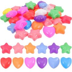 many different colored stars and hearts on a white background