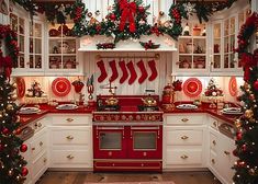 a kitchen decorated for christmas with red and white decor