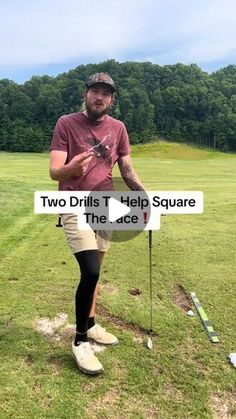 a man standing on top of a lush green field next to a sign that says two drills help square i the ace