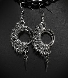 These earrings were inspired by a personal favorite artist of mine H.R. Giger - made with chainmail rings and spikes. Earring hooks are Stainless steel  They measure approximately 3 inches without a hook type. Length may vary depending on hook type. They are hand made and sizes may vary.  Handmade in the US Chandelier Crystal Jewelry, Chainmail Ring, Chainmail Earrings, Mail Ideas, Chainmail Jewelry, Unisex Earrings, Gothic Gifts, Favorite Artist, Handmade Jewelry Diy