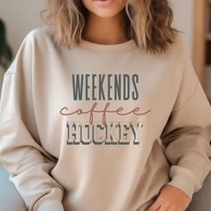 Cute, cozy, fun, hockey day sweatshirt. Ideal for any situation, a unisex heavy blend crewneck sweatshirt is pure comfort. These garments are made from polyester and cotton. This combination helps designs come out looking fresh and beautiful. The collar is ribbed knit, so it retains its shape even after washing. There are no itchy side seams on these sweaters. 50% cotton, 50% polyester, medium-heavy fabric  Loose fit, sewn-in label and runs true to size Fit is true to size. **Size up 1 or 2 sizes for an oversized fit** Letter Print Sweatshirt For Winter Weekends, Game Day Winter Sweatshirt With Text Print, Sporty Graphic Print Sweatshirt For Weekend, Women Hockey, Hockey Apparel, Hockey Hoodie, Hockey Sweatshirts, Hockey Clothes, Hockey Gifts