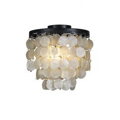 a light that is on top of a white ceiling fixture with lots of beads hanging from it