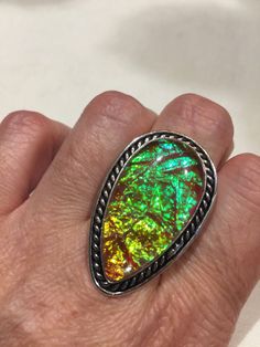 Large dichroic art glass Vintage ring Low content silver not sterling. All rings are shipped in a nice gift box. Check out our over a THOUSAND great reviews Engraving is $4 per letter and is not always perfect depending on the piece. It can take a few days if the jeweler is busy. This is payable to Paypal Judithsltd@gmail.com Iridescent Spiritual Rings As Gifts, Iridescent Cabochon Ring As Gift, Iridescent Cabochon Rings As Gift, Collectible Iridescent Cabochon Jewelry, Iridescent Sterling Silver Rings For Gifts, Iridescent Jewelry With Natural Inclusions For Gift, Handmade Iridescent Rings As Gifts, Handmade Iridescent Opal Ring As Gift, Handmade Iridescent Rings For Gifts