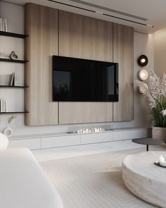 a modern living room with built in entertainment center