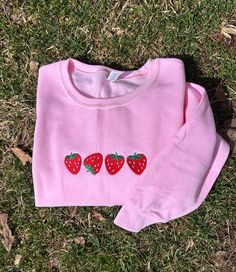 Made to order embroidered sweatshirt! Perfect for your favorite strawberry lover! Pictured in light pink! Other colors available upon request! Sweatshirts are Jerzees/ Gildan brand and UNISEX sizing. Size up for an oversized fit! **Machine wash COLD and hang dry to extend embroidery life** Sweatshirts are made to order so processing time is 3-7 business days. Please message me if you need your order sooner, and I will do everything I can to get it to you ASAP! Message me for any custom orders! Pink Sweatshirt With Custom Embroidery In Relaxed Fit, Trendy Embroidered Pink Sweatshirt, Cute Embroidered Sweatshirt For Spring, Lovers Pics, Fruit Summer, Strawberry Fruit, Embroidered Crewneck, Embroidered Sweatshirt, Embroidered Sweatshirts