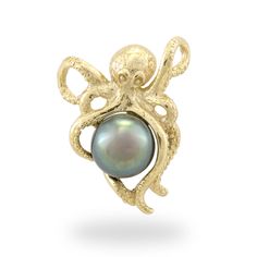 an octopus ring with a pearl in it's center, on a white background