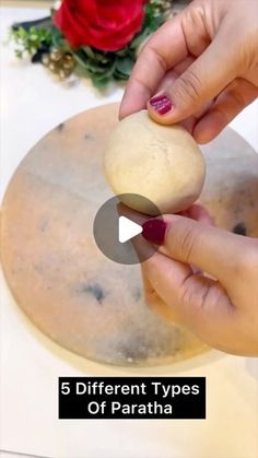 a person is making some food on a table with flowers in the background and text that reads, 5 different types of paratha