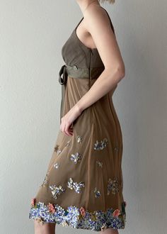 "Rare Vintage John Galliano babydoll silk dress. High waist. Featuring hand beaded mesh skirt overlay. Silk bow in the front. size 42, L(can also fit M). Pit to pit 36\", higher waist 32\". Excellent condition." Sheer Mesh Summer Evening Dress, Sheer Mesh Dress For Summer Evenings, Sheer Mesh Evening Dress For Summer, Embellished Mesh Cocktail Dress For Summer, Spring Sleeveless Organza Mesh Dress, Spring Organza Dress With Sequins, Spring Organza Sequin Dress, Spring Organza Embellished Dress, Summer Fitted Embellished Mesh Dress