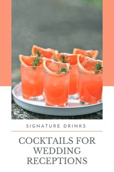 cocktails for wedding reception with orange slices and rosemary garnish on the rim