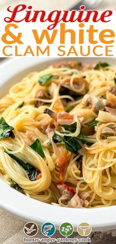 a white bowl filled with linguine and white clam sauce on top of a table