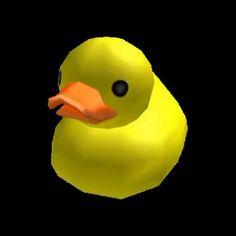 a yellow rubber duck floating in the dark