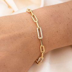 Our 14k Diamond Link Paper Clip Bracelet is a classic take on a paper clip bracelet, while adding just the right amount of bling to give you that extra shimmer. 14k Solid Gold and Genuine Diamonds .80 CTW Diamond Quality SI1 - SI2, Color GH Available in lengths 6.5" and 7" Due to the handmade nature of this bracelet, please allow 1 - 2 weeks for processing. Paper Clip Bracelet Gold, Paper Clip Bracelet, Paperclip Bracelet, Toluca Lake, Link Necklace, Paper Clip, Delicate Bracelet, Small Gifts, Handmade Natural