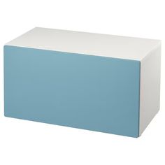 a blue and white box sitting on top of a table