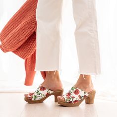 A romantic take on our open-toe mule clog. The textured white leather upper is embossed with a gorgeous floral motif. Handcrafted in Italy from premium leather, the Frida clog features a cushioned sole that flexes as you walk for all-day comfort. Pair with a floaty dress or wide-leg jeans for a dreamy look. Flexible sole with wood-like effect Heel 7,5 cm / 2.95 Inches Handmade in Italy High Heel Clogs With Cork-bed Midsoles, Spring Clogs With Padded Open Heel, Spring Clogs With Padded And Open Heel, Spring Clogs With Padded Heel And Open Back, Spring Clogs With Padded Heel And Open Heel, Spring Block Heel Clogs With Cork-bed Midsoles, White Open Heel Mules With Cushioned Footbed, White Mules With Cushioned Footbed And Open Heel, White Cushioned Open Heel Mules