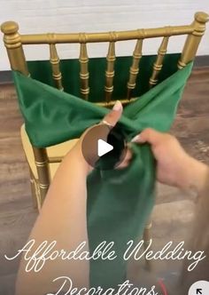 a person is tying a green chair with a bow around their neck and the words, affordable wedding decorations on it