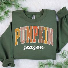 Cute Pumpkin Season Sweatshirt, Pumpkin Patch Sweater, Fall Season Gifts, Autumn Vibes Shirt, Hello Fall Shirts, Cute Autumn Sweatshirts ---How To Order --- 1-) Please, check and review all photos 2-) Choose your t-shirt size and color 3-) Click add to cart. You can go back to add more product 4-)Click "Proceed to check out" 5-)When you check out, you can add a note to seller for any request ---Production and Shipping--- * High quality and super soft, comfortable shirt. Made with top-of-the-line College Letter Print T-shirt For Fall, Cotton T-shirt For College In Fall, Cotton T-shirt For Fall, Fall College Graphic Print Tops, Fall Graphic Print College Top, Casual Fall Tops With Lettering, Green Fall Sweatshirt For College, Fall Cotton Sweatshirt With Lettering, Fall College Letter Print T-shirt