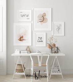 a white desk with some pictures on the wall