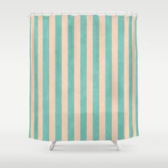 a shower curtain with green and beige stripes on the outside, in front of a white background