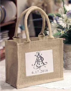 a burlap bag with a monogrammed logo on it