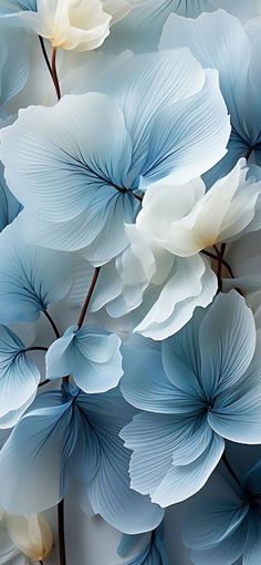 blue and white flowers are arranged in the shape of an abstract flower arrangement, with large petals