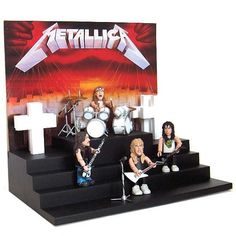 the band metallic figurines are on display