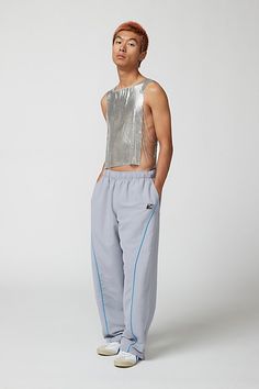 Troye metal tank top in a sleeveless style with an open back and cropped fit. Content + Care Mixed metals Wipe clean Imported Size + Fit S/M Dimensions Chest: 26" + 6" extender Length: 22" L/XL Dimensions Chest: 30.5" + 6" extender Length: 22.5" | Troye Metal Tank Top in Silver, Men's at Urban Outfitters Urban Outfitters Sleeveless Tank Top For Party, Urban Outfitters Party Crop Top, Urban Outfitters Cropped Crop Top For Party, Metal Tank Top, Metal Tank, Mens Home, Brand Sale, Mixed Metals, Beauty Brand