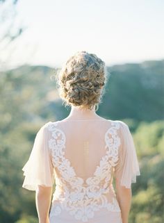 the back of a woman's wedding dress