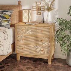 a bedroom scene with focus on the nightstand and bed side table in the foreground