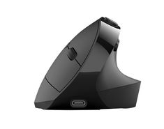 a computer mouse sitting on top of a black stand