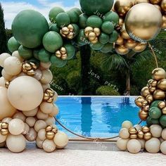 some balloons that are next to a pool