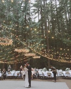 an instagram page with a photo of a bride and groom at their wedding in the woods