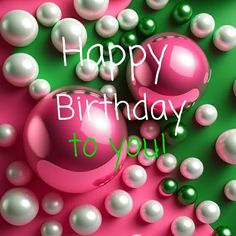 happy birthday to you card with pink and green balls, pearls and streamers in the background