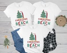 If you're spending Christmas on the beach this year, these Christmas At The Beach shirts are perfect! These ultra soft tropical Christmas shirts makes perfect for Christmas vacation shirts for the whole crew and can be personalized with the year/location for an extra touch! These family Christmas group shirts are perfect matching tees for the whole family! ✺ CHECK OUT more like this in our WINTER | CHRISTMAS section: https://www.etsy.com/shop/sagicrabboutique?section_id=39392962 ✺  WANT SOMETHIN Christmas On The Beach, Vacation Shirts Family, Christmas At The Beach, Christmas Vacation Shirts, Tropical Christmas, Beach Christmas, Group Shirts, Matching Tees, Hawaii Beaches