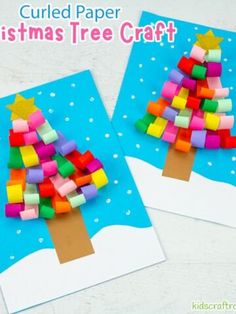 two christmas tree crafts made out of colored construction paper on top of a blue background