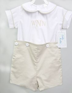 "He will look super cute in a ring bearer outfit for a wedding by Zuli Kids. Ring bearer outfit is a 2 piece white and beige button-on romper. Available plain or with monogram. *Zuli Kids Premium Quality *Peter Pan Collar Shirt *65% cotton 35% Poly Shirt - 100% Cotton Pant *Machine Wash Gentle *Button-Back Closures *Snaps in Crotch for Easy Diaper Change on sizes 24 Mo and smaller *Piping in Peter Pan Collar *Baptism, Christening or Ring Bearer Outfit *Available in Size NB - 4T WHATS INCLUDED On Baby Boy Formal Wear, Baby Boy Dressy Outfits, Toddler Wedding Outfit Boy, Baby Boy Dress Clothes, Boy Wedding Outfit, Baby Boy Wedding Outfit, Boys Dressy Outfits, Baby Sports Clothes, Ring Bearer Ideas